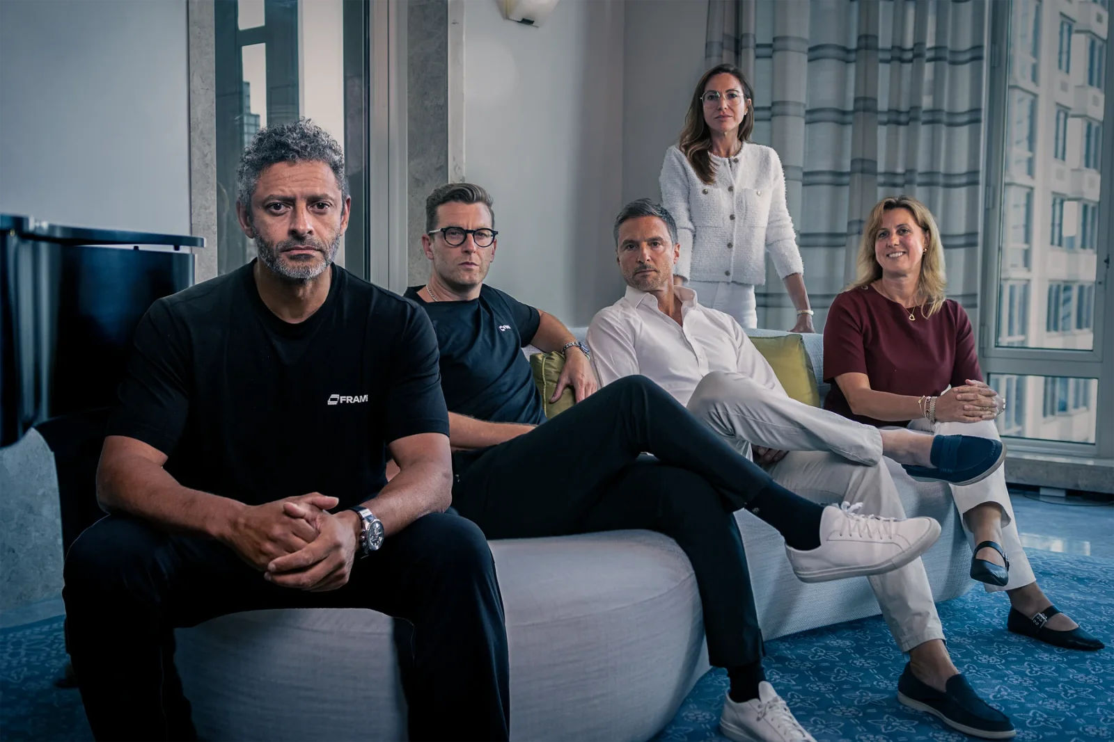 Members of the Frame leadership team together in a meeting space